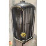 A Riley chrome radiator surround, 69 cm high