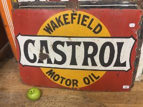 An enamel sign, Wakefield Castrol Motor Oil, 51 x 75 cm Some loss, especially to the right hand edge