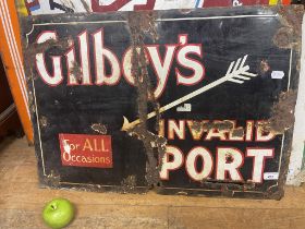 An enamel sign, Gilbey's Invalid Port, 54 x 77 cm Creased and with loss