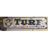 An enamel sign, Turf Top Quality Cigarettes, 38 x 163 cm Some staining, some areas touched up/