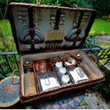 A good Scott & Sons 1920s wicker cased picnic set, complete with a set of six Bisto white bone china