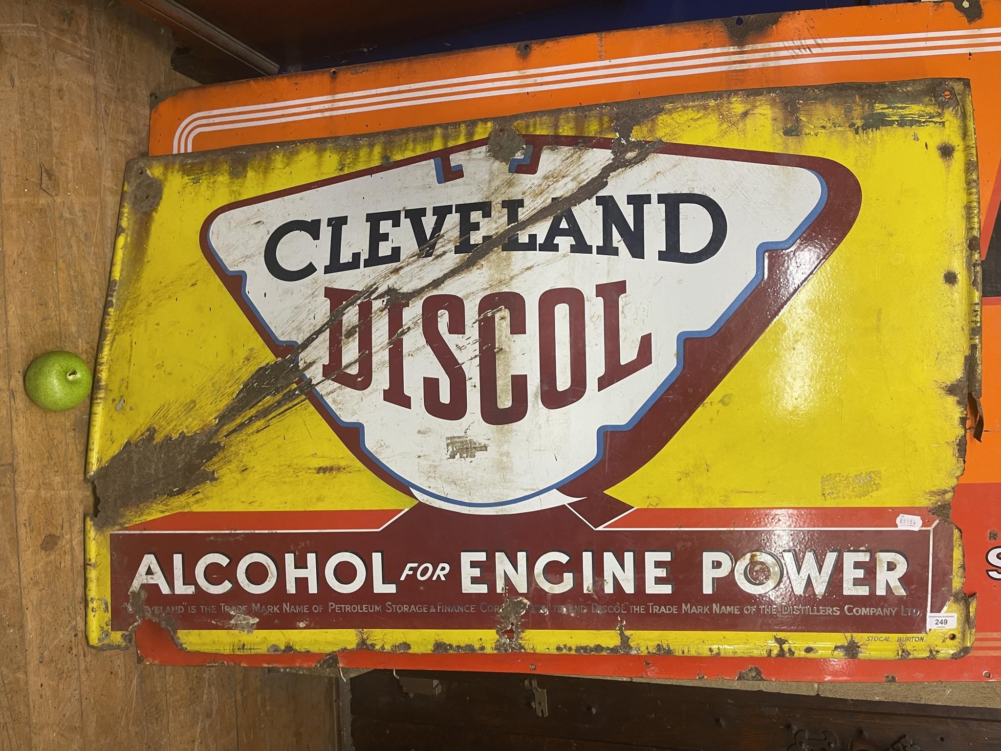 An enamel sign, Cleveland Discol Alcohol for Engine Power, 75 x 123 cm Creased, bent, general loss