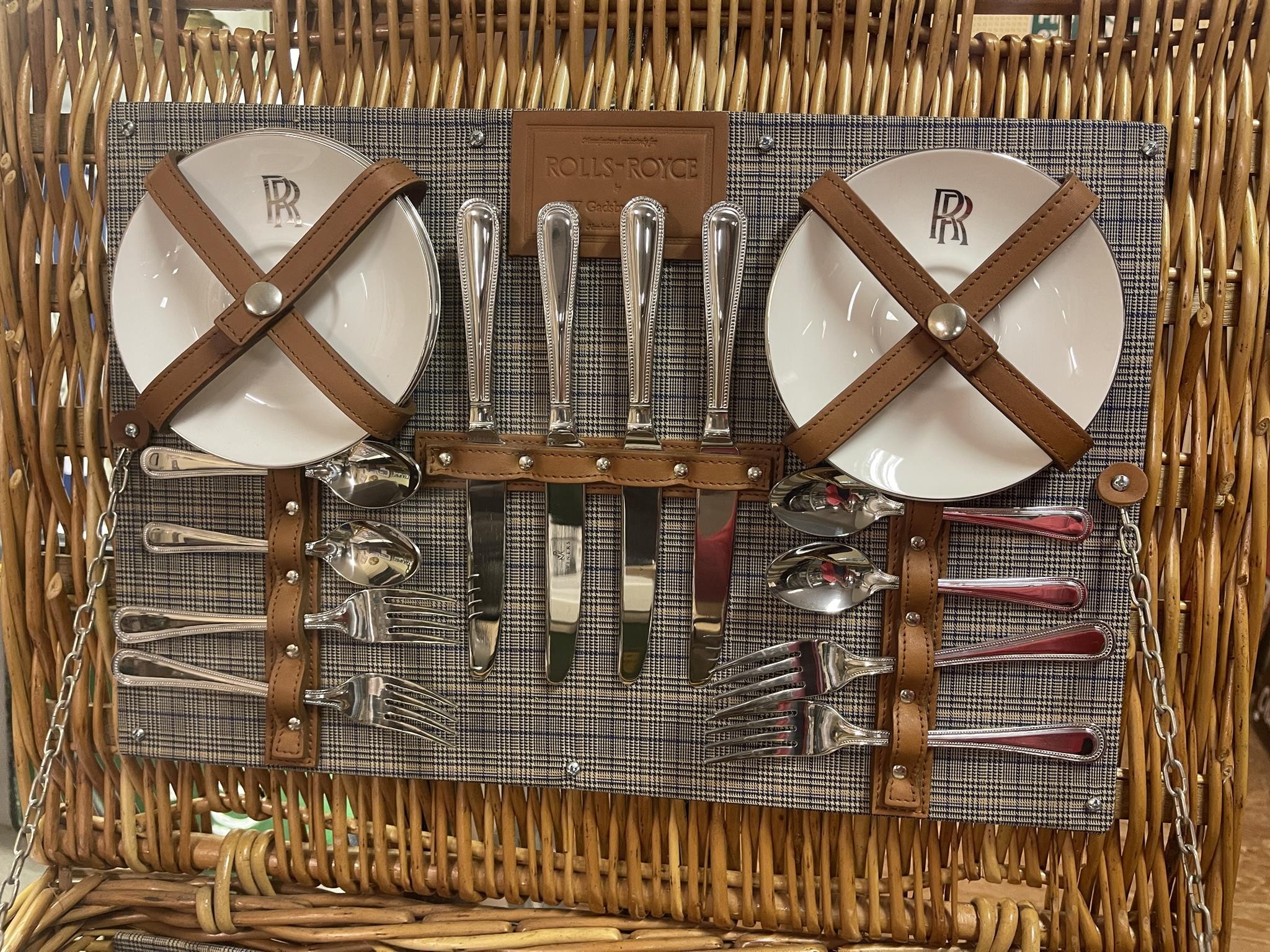 An official Rolls-Royce issue willow picnic hamper, by Gadsby & Co, for four persons, with