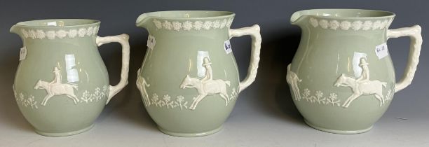 A graduated set of three Spode Fortuna jugs, decorated hunting scenes, 18 cm high (3)