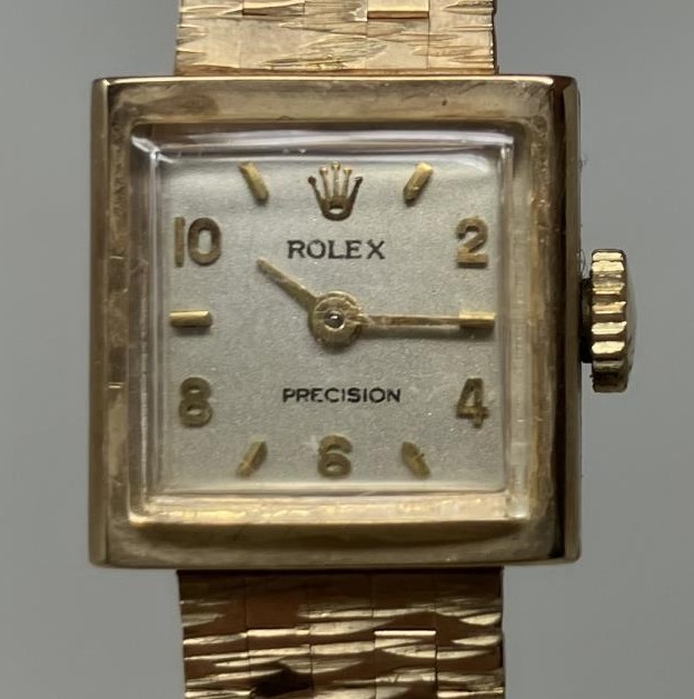 A ladies 9ct gold Rolex wristwatch, on a 9ct gold strap, in a Rolex box 27.7 g all in Winds and runs