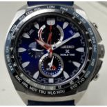 A gentleman's stainless steel Seiko Chrono World Time Solar wristwatch, on a rubber strap, boxed,