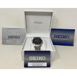 A gentleman's stainless steel Seiko Chronograph 100m wristwatch, boxed with instructions and spare