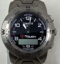 A gentleman's titanium Tissot T-Touch 253/353 wristwatch, boxed minute hand currently working,