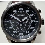 A gentleman's stainless steel Citizen Eco-Drive chronograph wristwatch, on a leather strap, boxed,