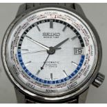 A gentleman's stainless steel Seiko World Time Automatic wristwatch, cased Box very worn Currently