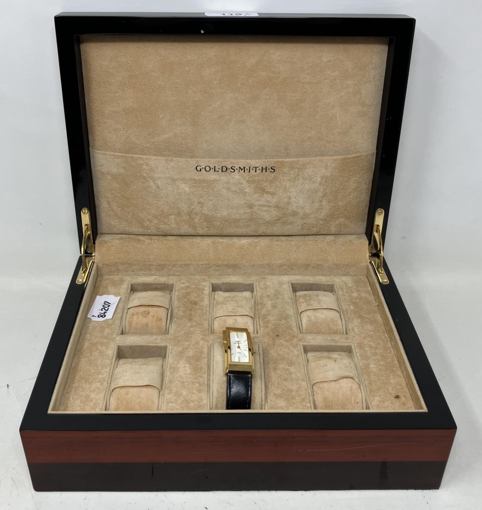 A Goldsmiths watch box, to hold six watches, 25.5 cm wide, a gentleman's stainless steel Rotary