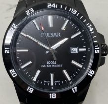 A gentleman's stainless steel Pulsar 100M water resist wristwatch, boxed, with instruction manual