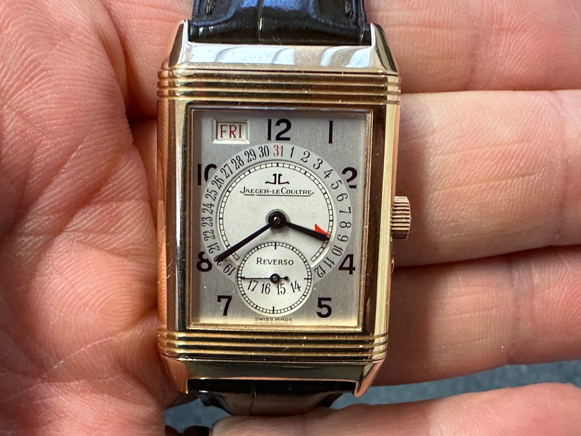 A gentleman's 18ct gold Jaeger-LeCoultre Reverso Date calendar wristwatch, reference 270.236, the