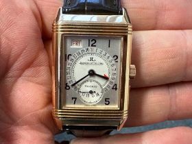 A gentleman's 18ct gold Jaeger-LeCoultre Reverso Date calendar wristwatch, reference 270.236, the