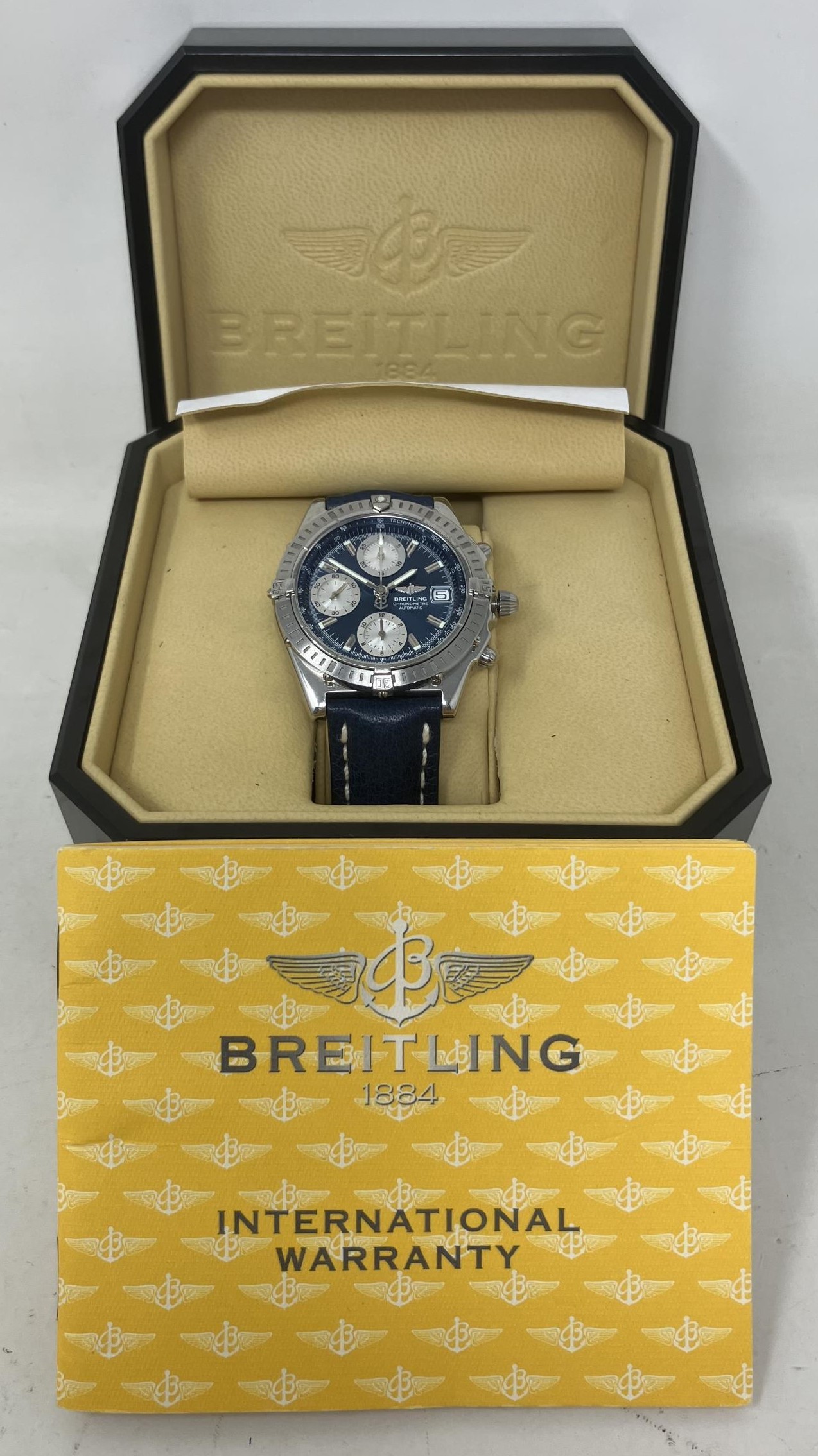 A gentleman's stainless steel Breitling Chronometre Automatic wristwatch, with a blue dial, on a - Image 2 of 3