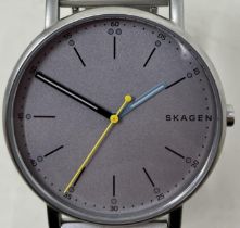 A gentleman's stainless steel Skagen Signatur SKW6375 wristwatch, boxed, with instructions and