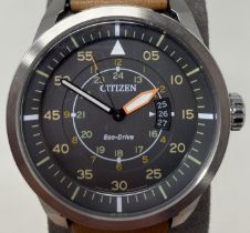 A gentleman's stainless steel Citizen Eco-Drive WR200 wristwatch on a fabric strap, boxed, and