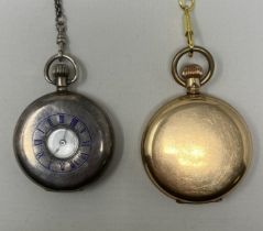 A silver half hunter pocket watch, with an Albert, and a gold plated hunter pocket watch, on a