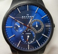 A gentleman's titanium Skagen 809XLTBLN wristwatch, on a leather strap, boxed, with warranty and