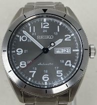 A gentleman's stainless steel Seiko Automatic wristwatch, boxed, with instructions and spare links