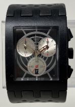 A gentleman's plastic 007 Dr. No Danjaq Swatch Chrono wristwatch, on a rubber strap, in a plastic