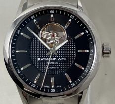 A gentleman's stainless steel Raymond Weil Geneve Automatic wristwatch, boxed, with instructions,