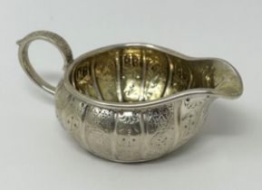 A Victorian silver cream jug, by Hunt & Roskell, London 1868, 2.6 ozt