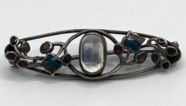 Attributed to Liberty, a pewter, moonstone and enamel brooch, believed to be by Jessie M King,