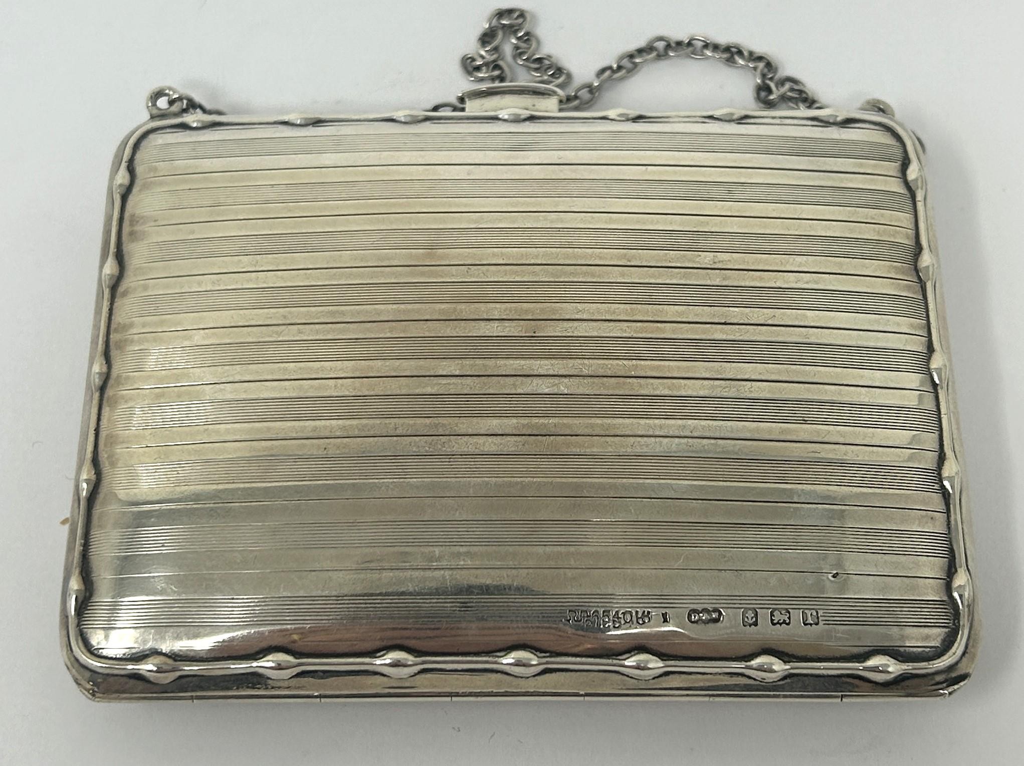 A George V silver purse, with a leather interior, Birmingham 1914, 4.2 ozt all in - Image 4 of 6
