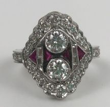 An Art Deco style 18ct white gold, diamond and ruby ring, of lozenge form, ring size N Diameter of