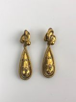 A pair of Indian yellow coloured metal and tear drop earrings