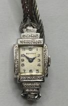 A ladies white gold and diamond Benrus cocktail wristwatch, on a later strap