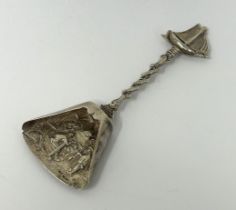 A Continental silver coloured metal novelty caddy spoon, with a ship finial, 18 g