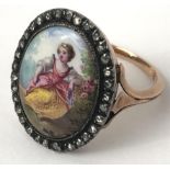 A late 19th century enamel and diamond ring, decorated a lady, ring size N