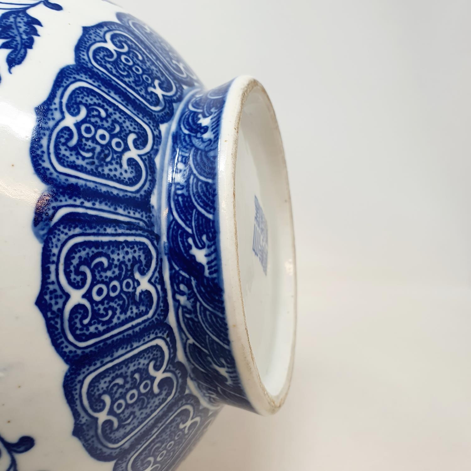 A Chinese blue and white bottle vase, decorated flowers in underglaze blue, bears a Qianlong mark, - Image 11 of 13