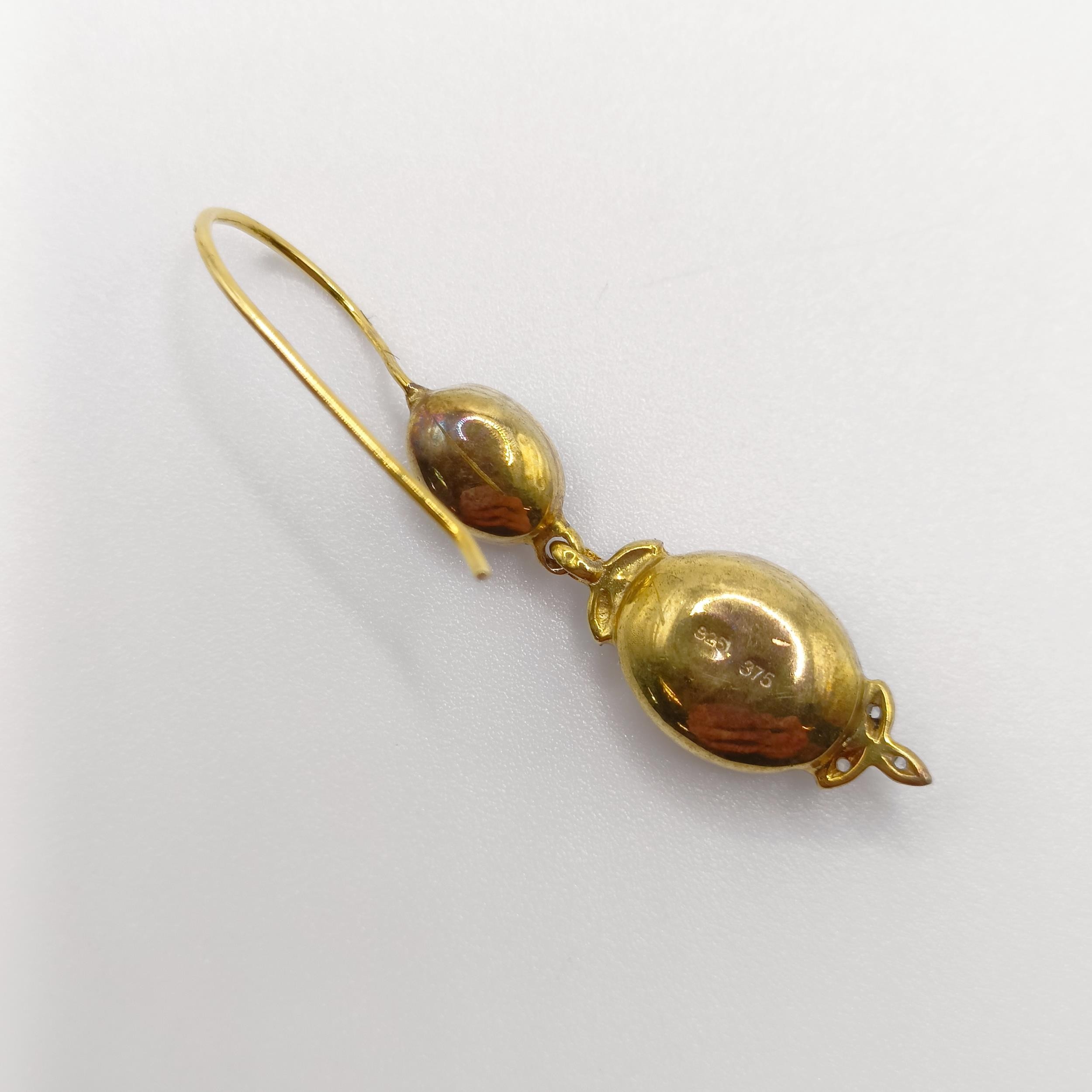 A pair of silver and 9ct yellow gold, cabochon garnet and diamond double drop earrings, with hook - Image 3 of 5