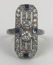 An Art Deco style platinum, sapphire and diamond panel ring, ring size M Diameter of largest two