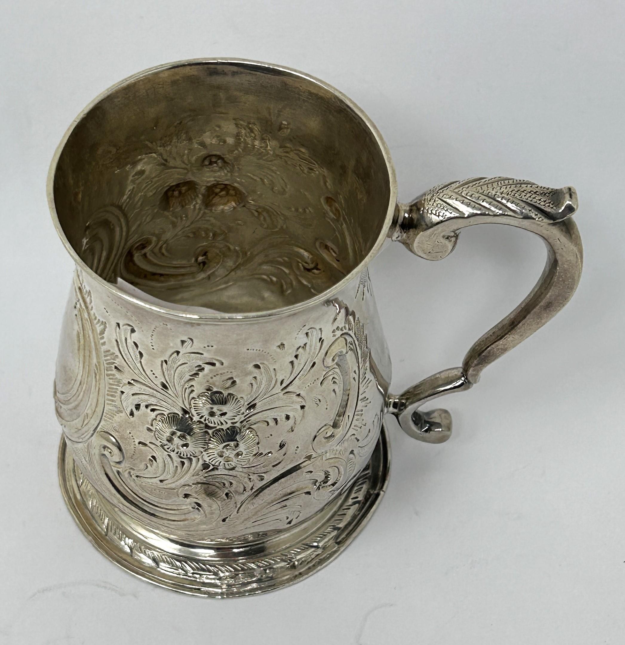 A George III silver mug, marks rubbed, later decorated, 5.1 ozt - Image 4 of 6