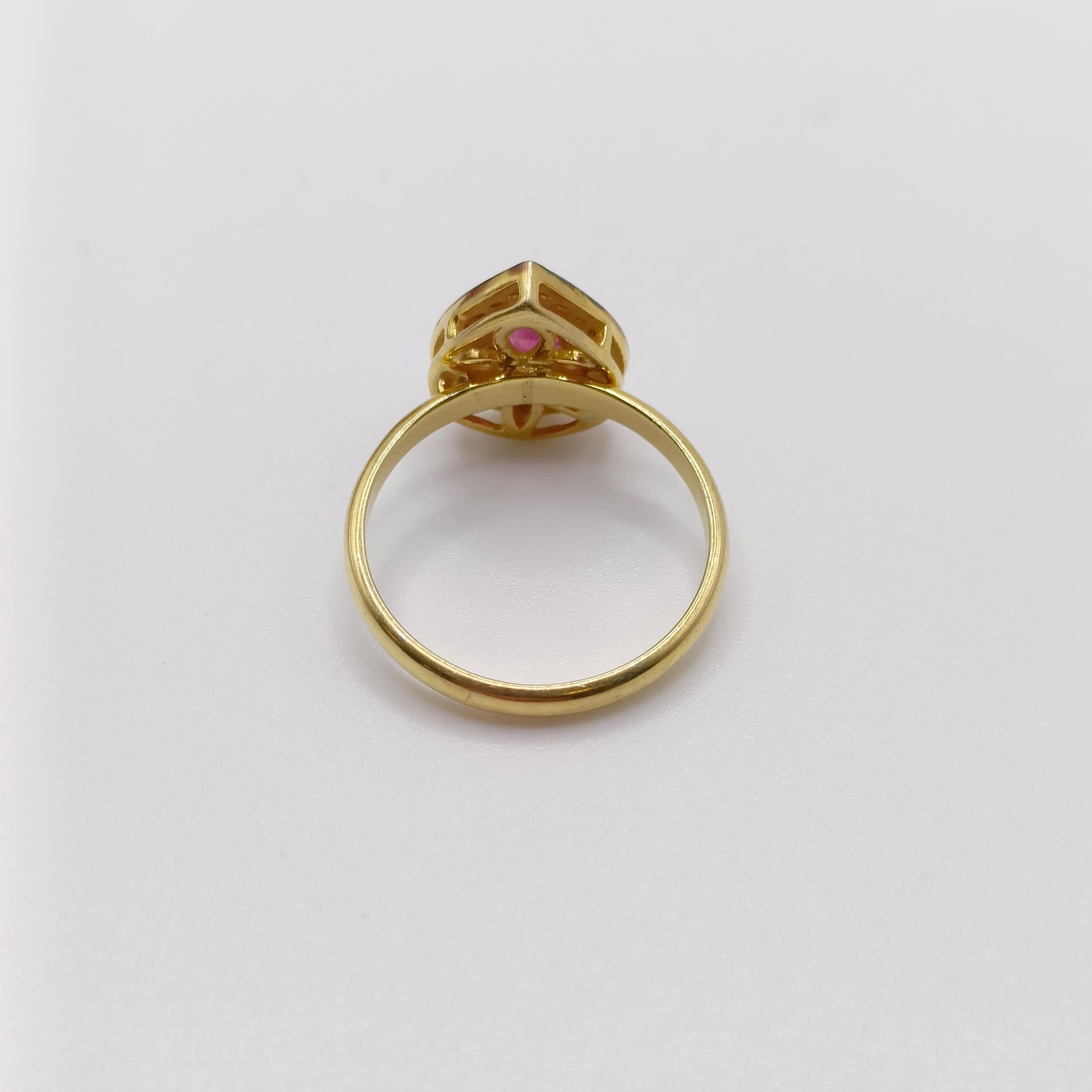 A pear shaped ring, set with pear shaped ruby and halo of R/C diamonds set in gold-plated silver, - Image 4 of 7