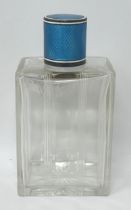A silver, blue and white enamel topped glass perfume bottle, 12 cm high