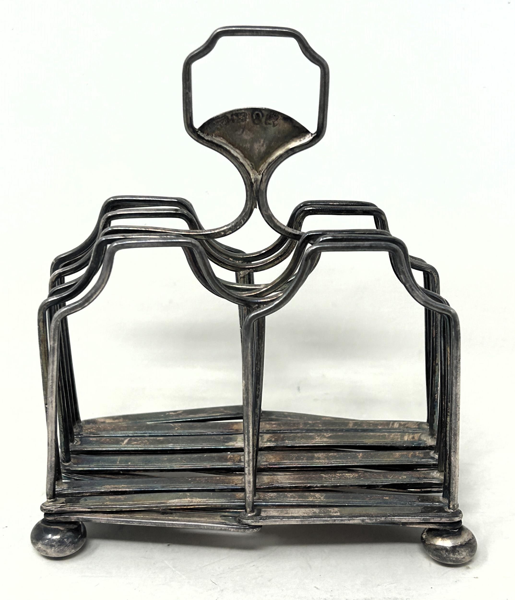 A George III concertina silver six section toast rack, London 1807, 6.8 ozt slightly out of shape, - Image 3 of 6