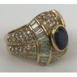 An 18ct gold, sapphire and diamond ring, ring size K