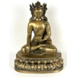 A gilt metal Buddha, 33 cm high