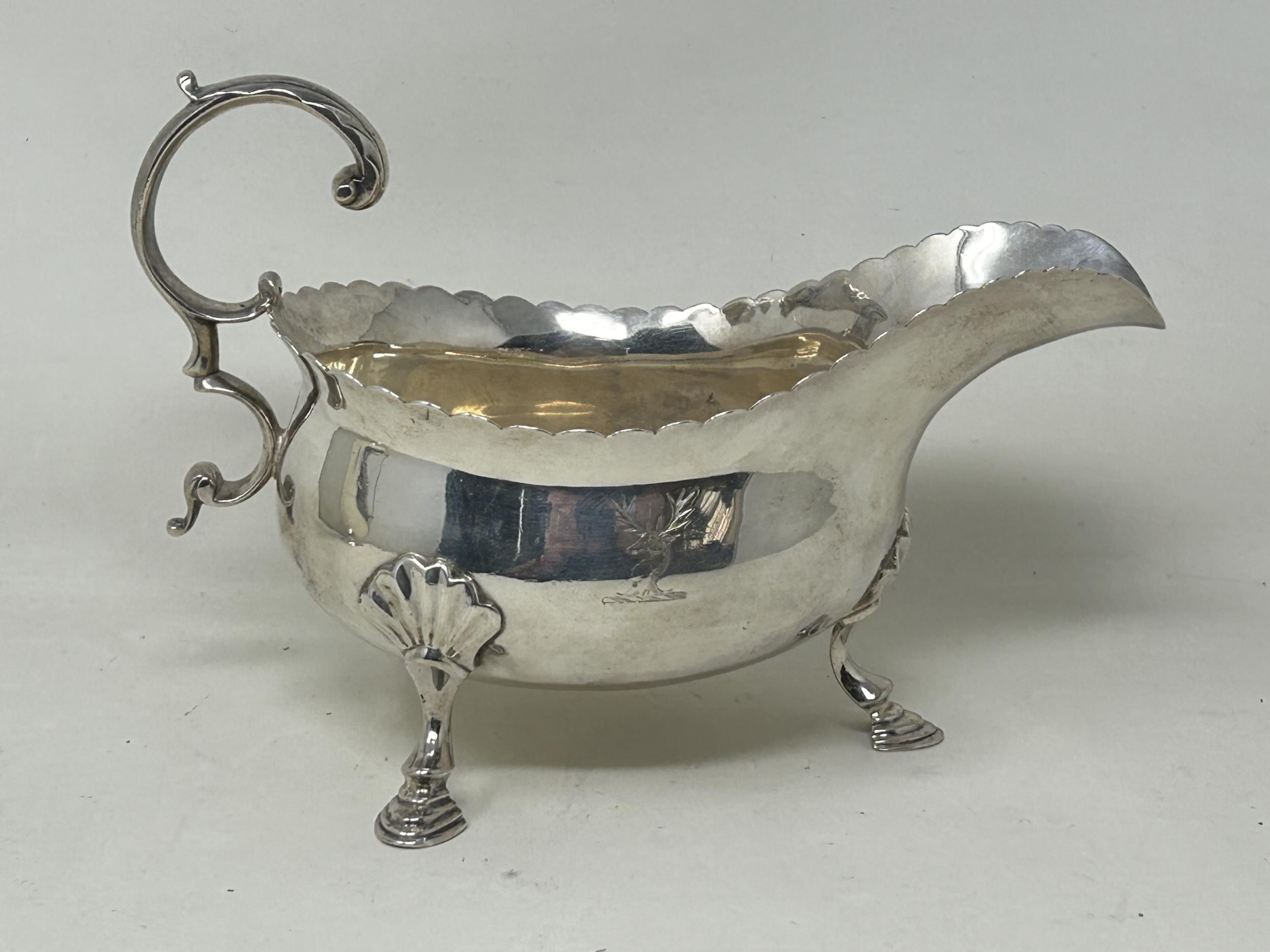 A pair of George III silver sauce boats, London 1818, 14 ozt