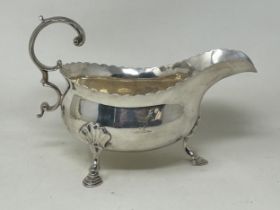 A pair of George III silver sauce boats, London 1818, 14 ozt