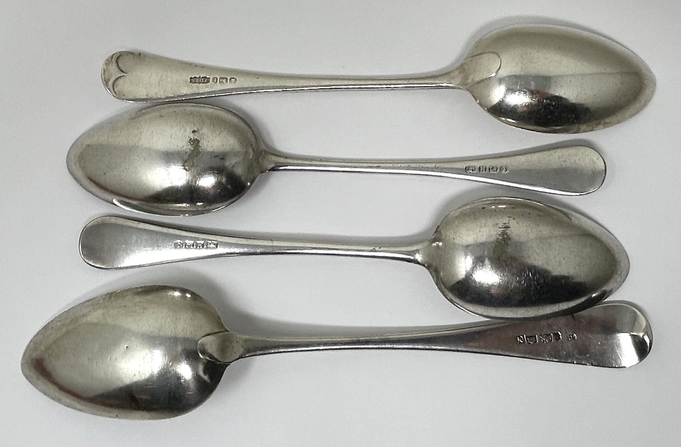 A George III silver Old English pattern serving spoon, London 1809, another, Sheffield 1911, and two - Image 2 of 4