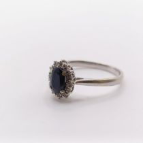 A 9ct gold, sapphire and diamond cluster ring, ring size R