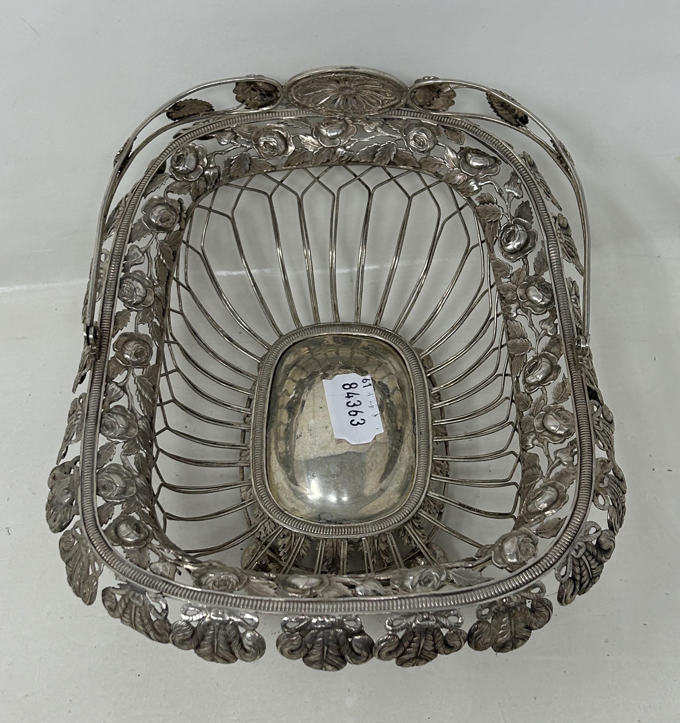 A silver coloured metal pierced swing handled basket 10.4 ozt - Image 4 of 6