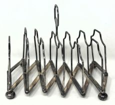 A George III concertina silver six section toast rack, London 1807, 6.8 ozt slightly out of shape,