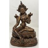 A gilt bronze Buddha, 22 cm high